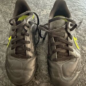 Black and Lime Green Nike Tiempo Cleats size 1Y. Genly used